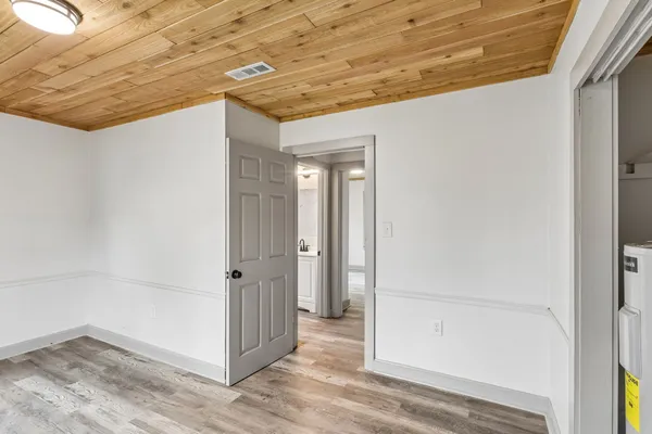 a view of a room with a large window