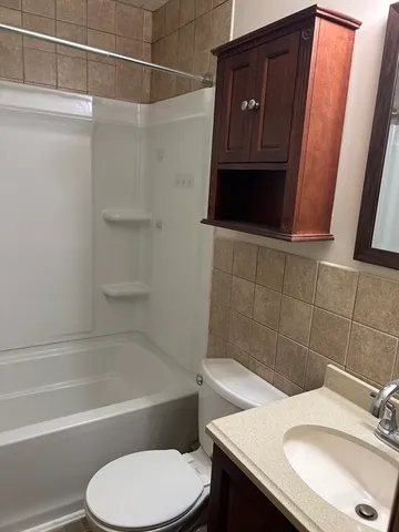 a bathroom with a sink and a toilet