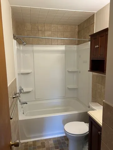 a front view of a house with garage