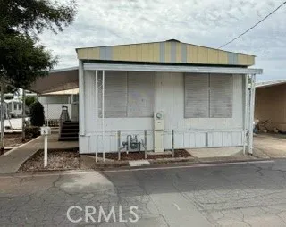 a front view of a house with a garage