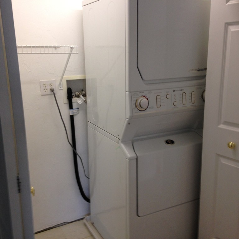 48 Independence Lane Ashland, MA 01721 - Photo 19 of 30 a utility room with dryer and washer