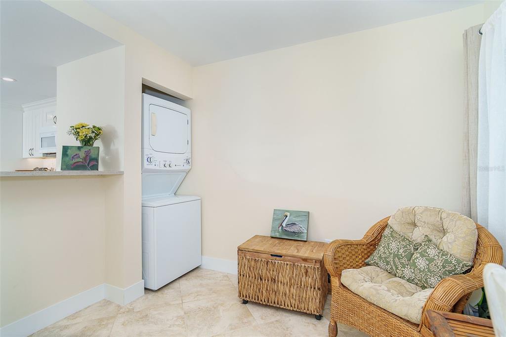 9200 Little Gasparilla, Unit 403 Boca Grande, FL 33921 - Photo 13 of 38 a living room with furniture and a couch