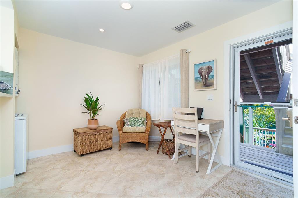9200 Little Gasparilla, Unit 403 Boca Grande, FL 33921 - Photo 14 of 38 a living room with furniture and a window