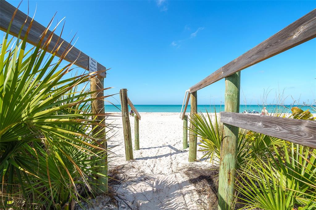 9200 Little Gasparilla, Unit 403 Boca Grande, FL 33921 - Photo 28 of 38 a view of a two chairs in the patio