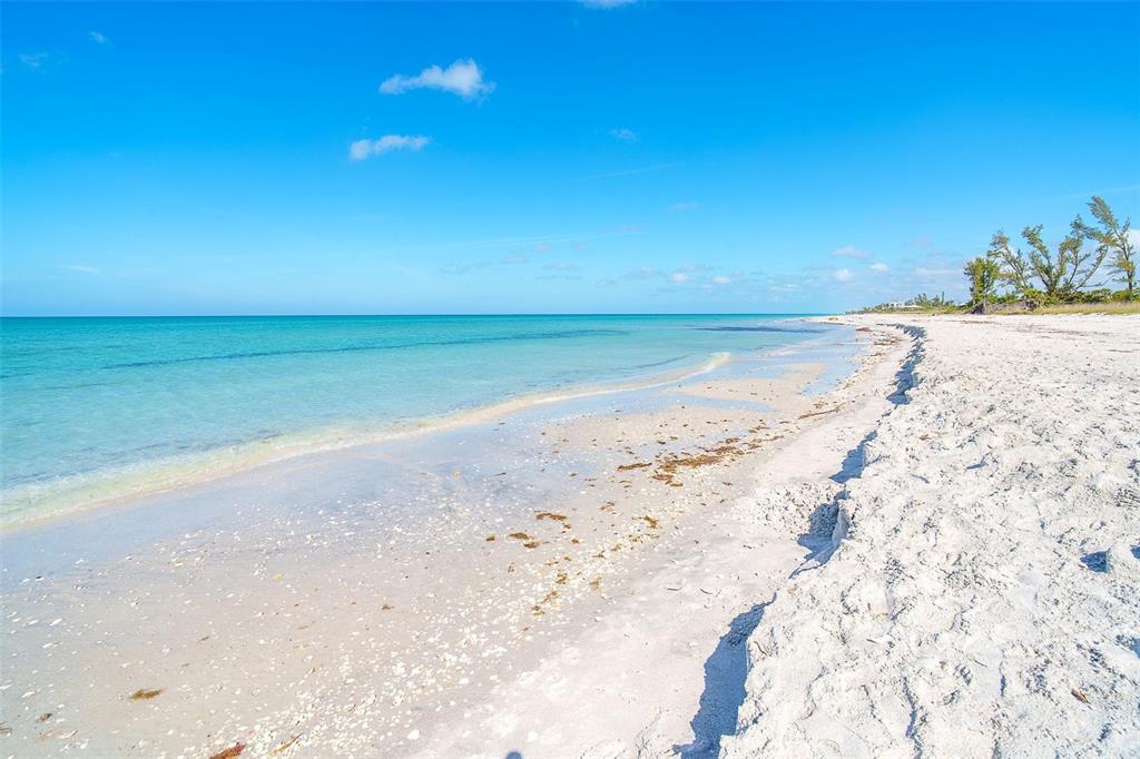 9200 Little Gasparilla, Unit 403 Boca Grande, FL 33921 - Photo 32 of 38 a view of beach and ocean