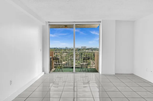 a view of a balcony with an ocean view