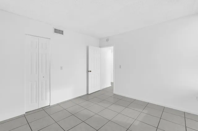 a bathroom with a shower curtain