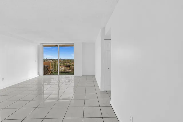 an empty room with shelves