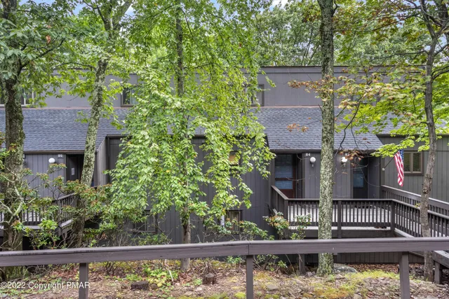 front view of a house with a small yard