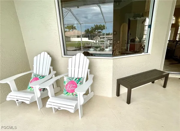 a bedroom with a bed and a table