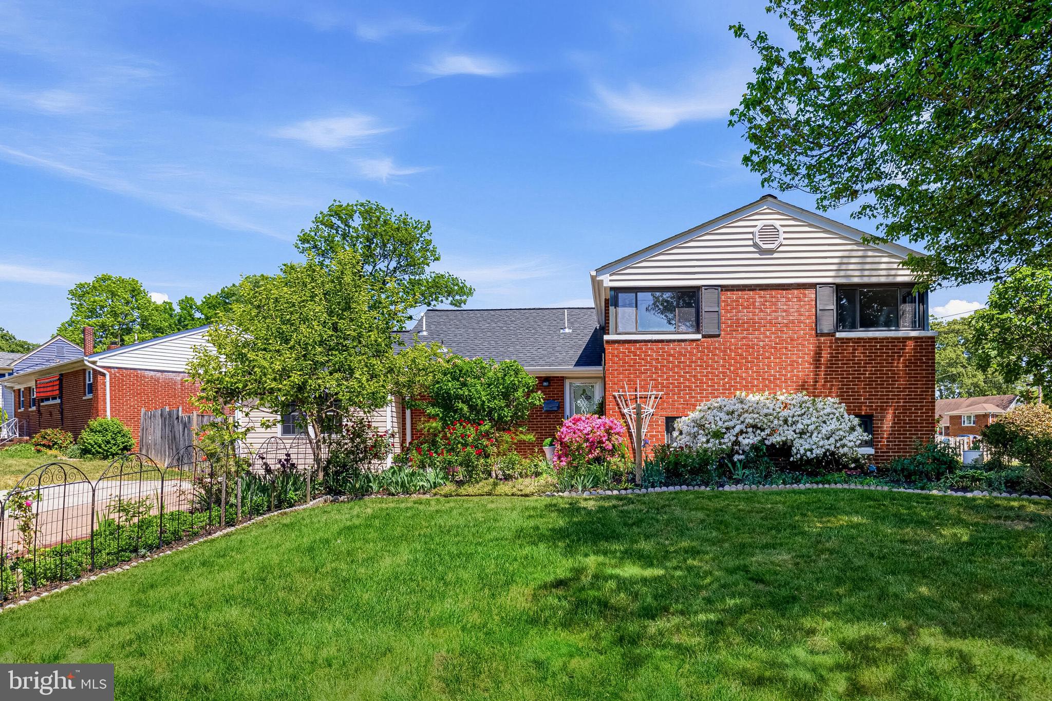 5917 Flanders Street Springfield, VA 22150 - Photo 2 of 40 a front view of house with garden