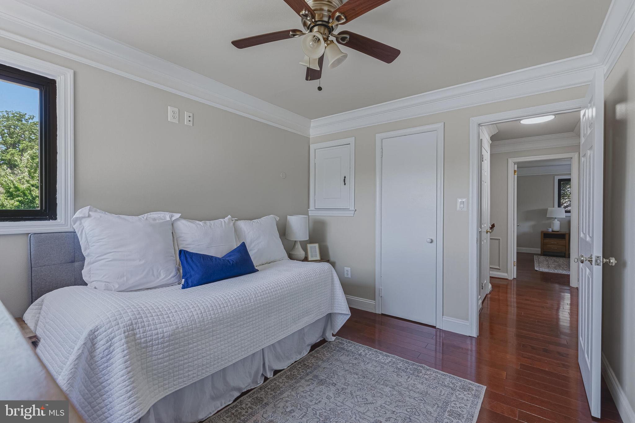 5917 Flanders Street Springfield, VA 22150 - Photo 22 of 40 a bedroom with a bed and a ceiling fan