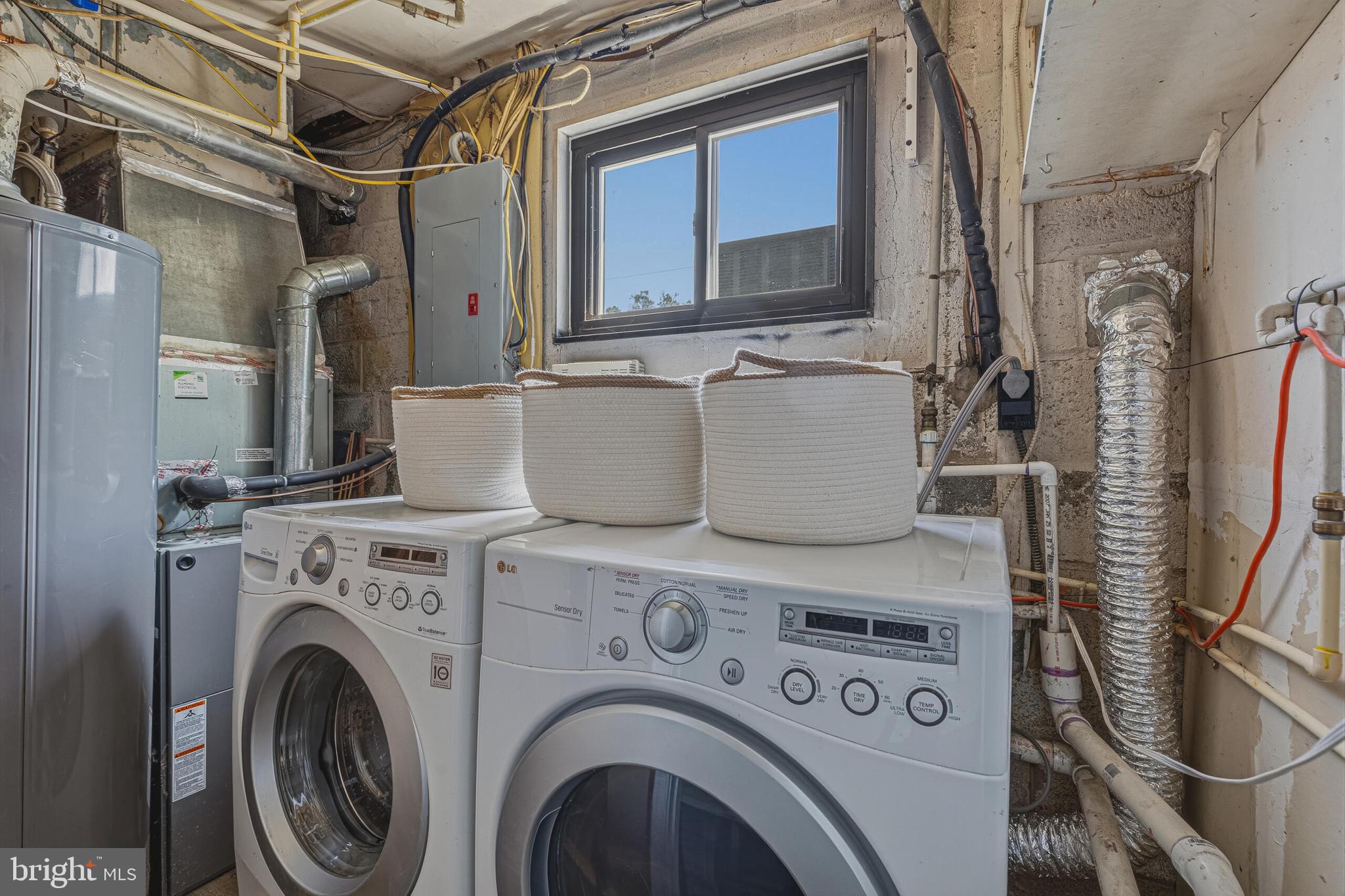 5917 Flanders Street Springfield, VA 22150 - Photo 33 of 40 a utility room with dryer and washer