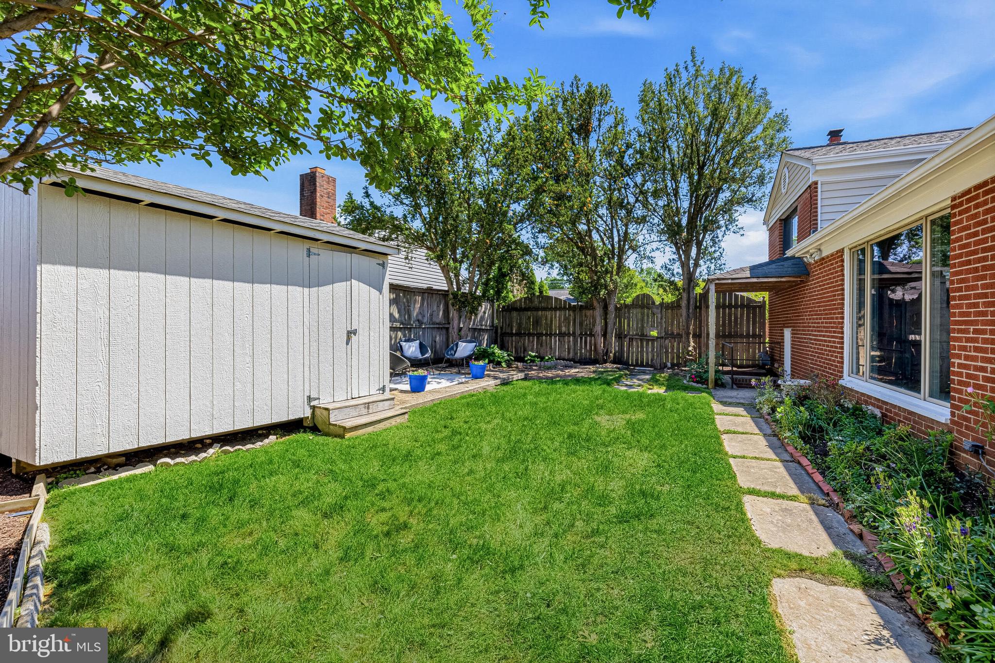5917 Flanders Street Springfield, VA 22150 - Photo 35 of 40 a view of a back yard with a house
