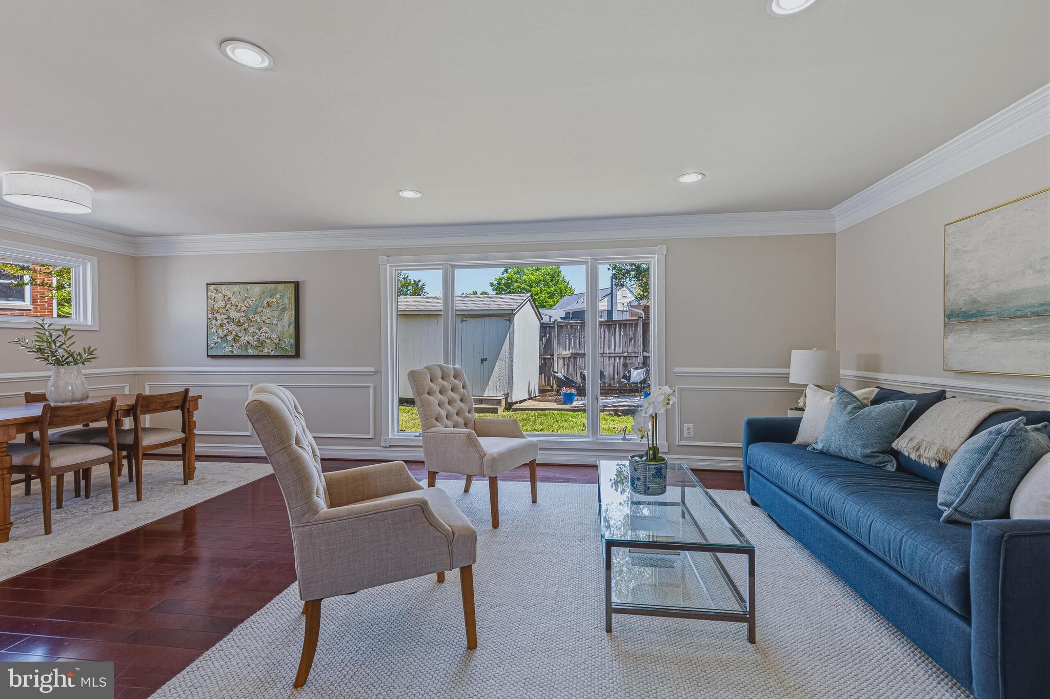 5917 Flanders Street Springfield, VA 22150 - Photo 5 of 40 a living room with furniture and a large window