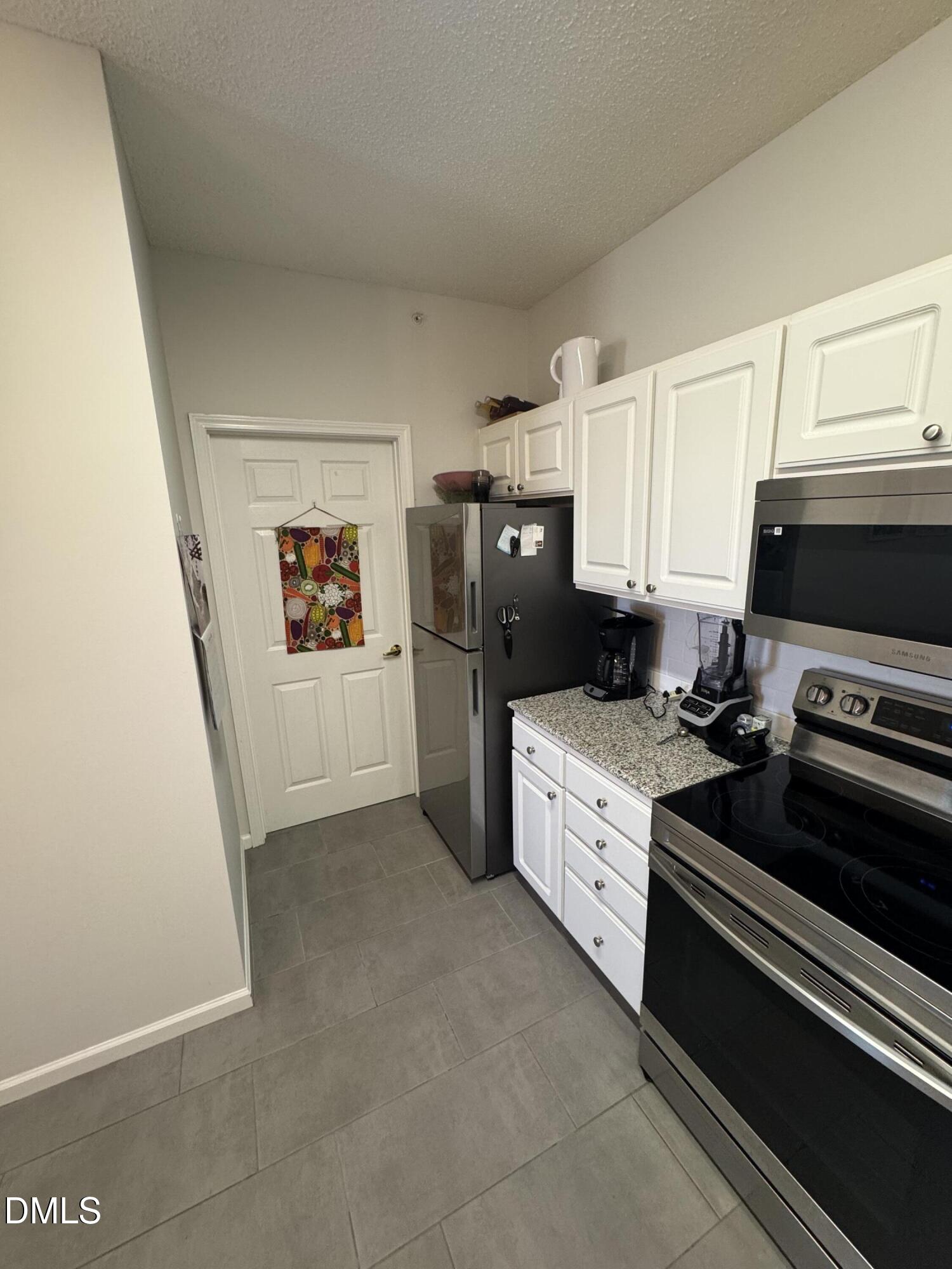 2511 Huntscroft Lane, Unit 303 Raleigh, NC 27617 - Photo 8 of 22 Kitchen