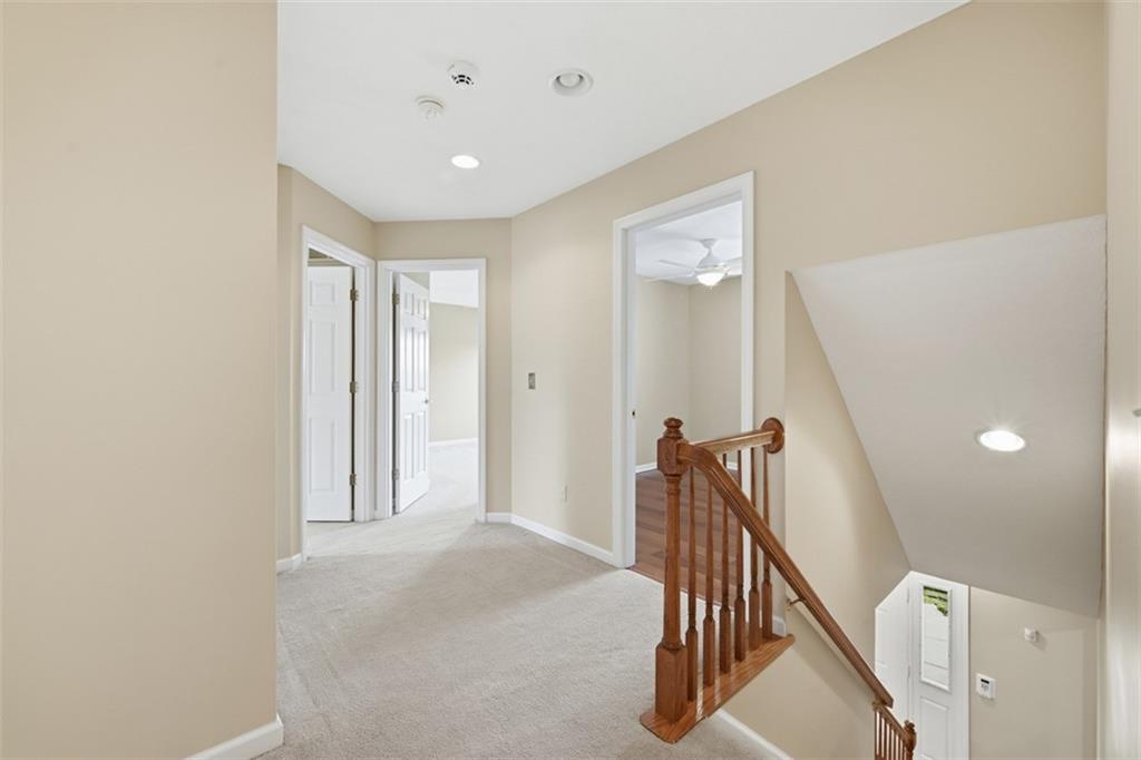 4003 Oak Point Circle McKees Rocks, PA 15136 - Photo 24 of 50 The second-floor hallway offers a practical and well-designed bedroom layout with soft neutral finishes and abundant natural light. Clean lines and a turnkey presentation continue throughout the upper level.