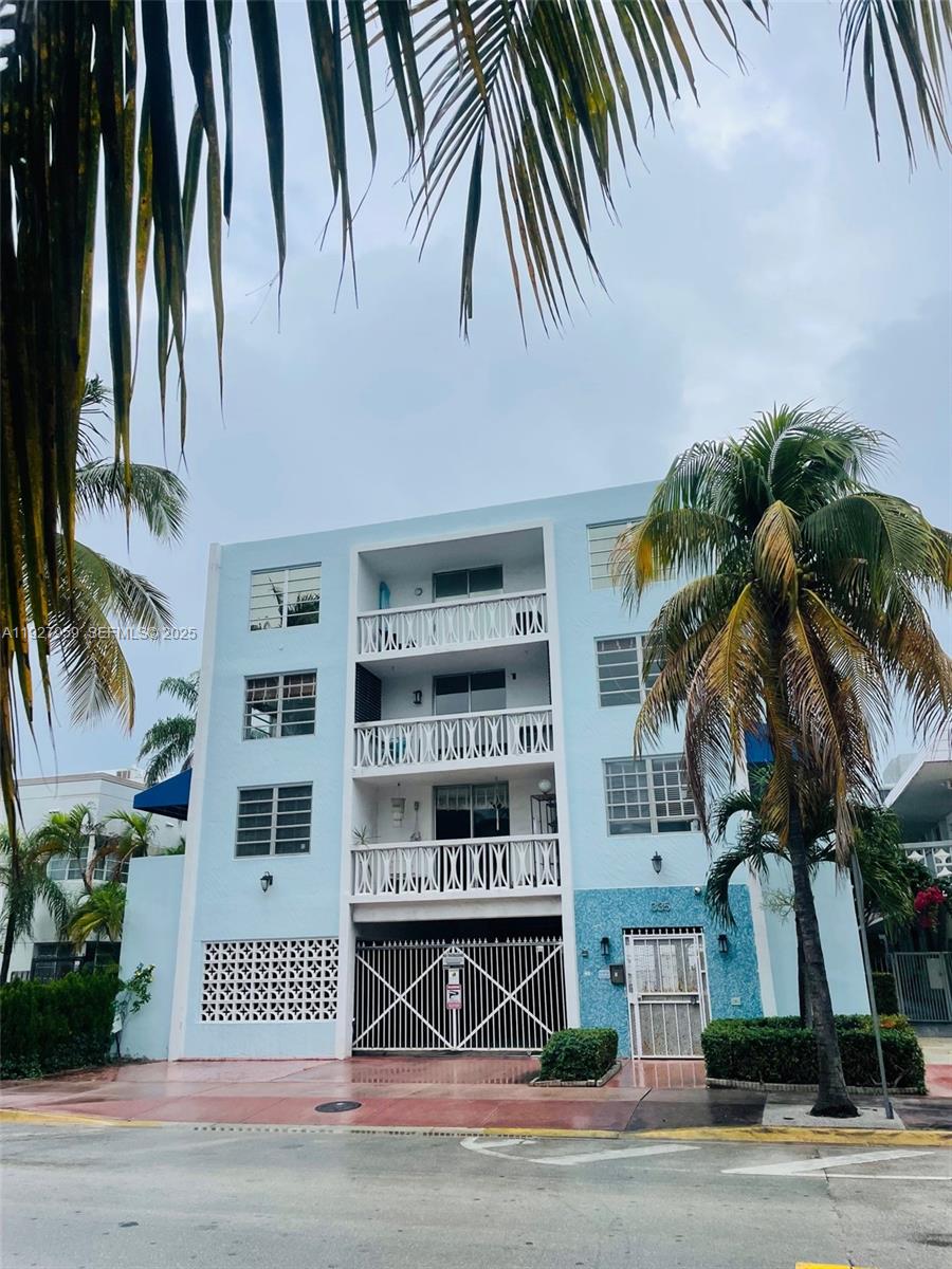 335 Collins Avenue, Unit 302 Miami Beach, FL 33139 - Photo 1 of 19 a view of a house with a street