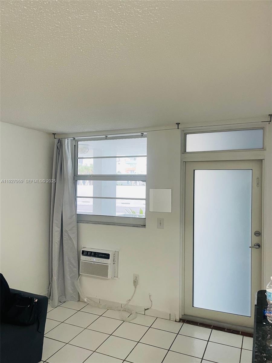 335 Collins Avenue, Unit 302 Miami Beach, FL 33139 - Photo 12 of 19 view of room with window
