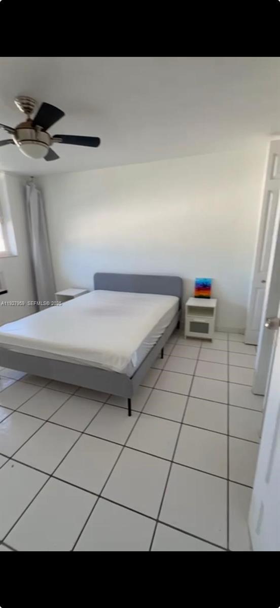 335 Collins Avenue, Unit 302 Miami Beach, FL 33139 - Photo 7 of 19 a bathroom with a sink and a shower