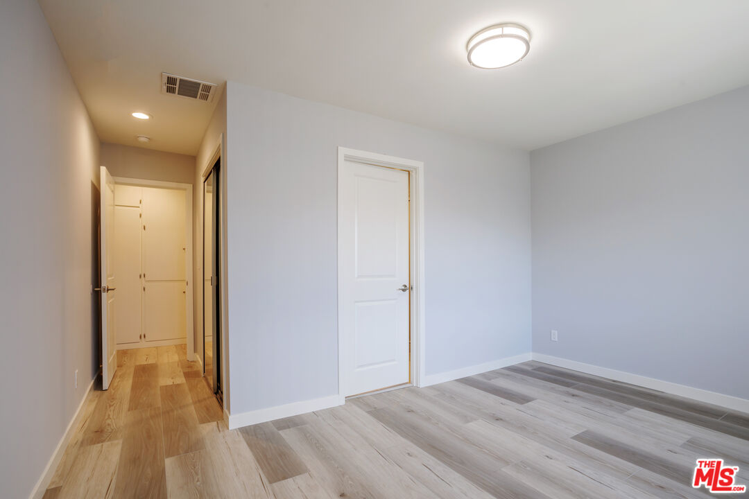 1116 San Rafael Avenue, Unit 6 Glendale, CA 91202 - Photo 18 of 23 a view of a livingroom with wooden floor