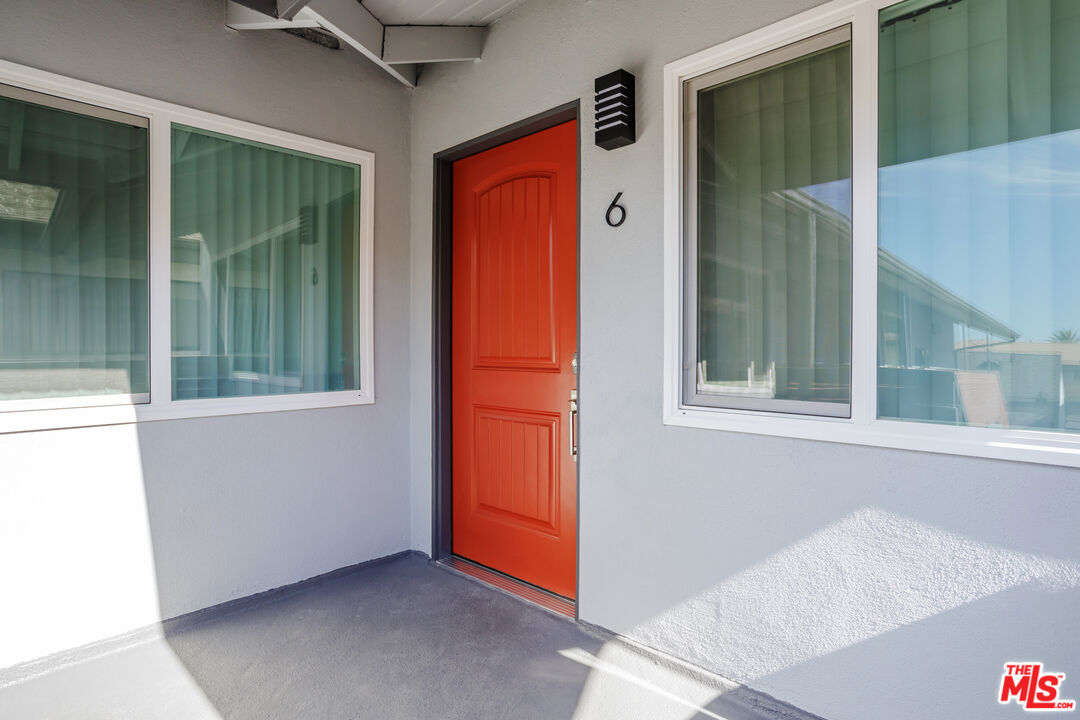 1116 San Rafael Avenue, Unit 6 Glendale, CA 91202 - Photo 2 of 23 image of a room that has a bed and a window