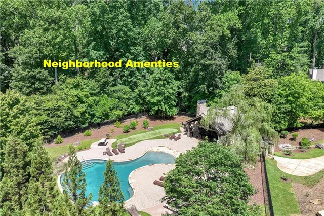 a view of a lake with a yard