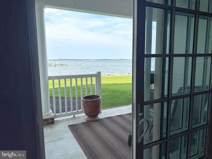 5 Oakley Street, Unit 102 Cambridge, MD 21613 - Photo 26 of 35 Springtime porch views from living area