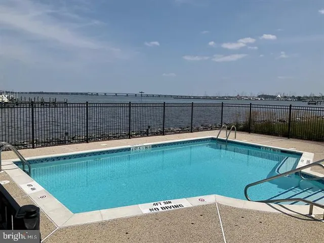 a view of a swimming pool with a terrace