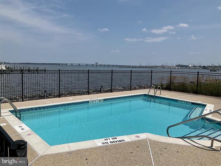 5 Oakley Street, Unit 102 Cambridge, MD 21613 - Photo 4 of 35 Community pool overlooking the Choptank
