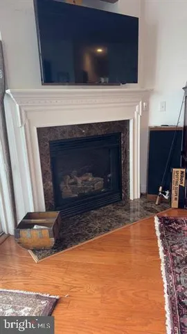 a living room with a fireplace