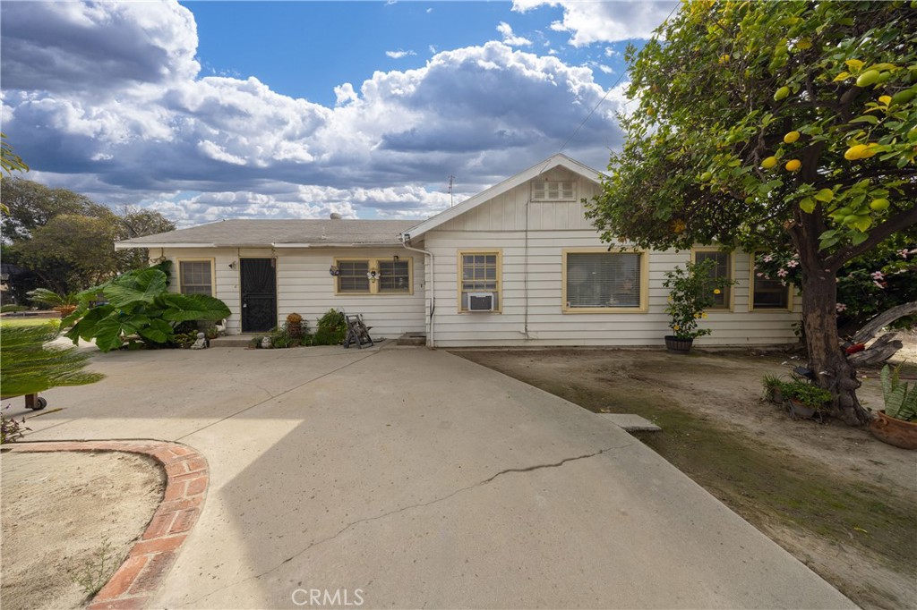 12203 Klingerman Street El Monte, CA 91732 - Photo 12 of 21 a front view of a house with a yard