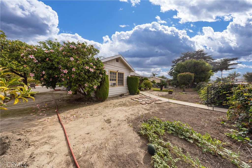 12203 Klingerman Street El Monte, CA 91732 - Photo 14 of 21 a view of a house with a yard