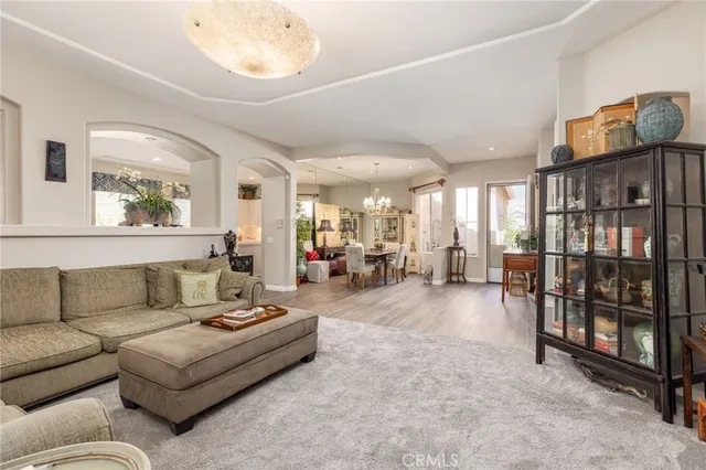 a living room with furniture and a table