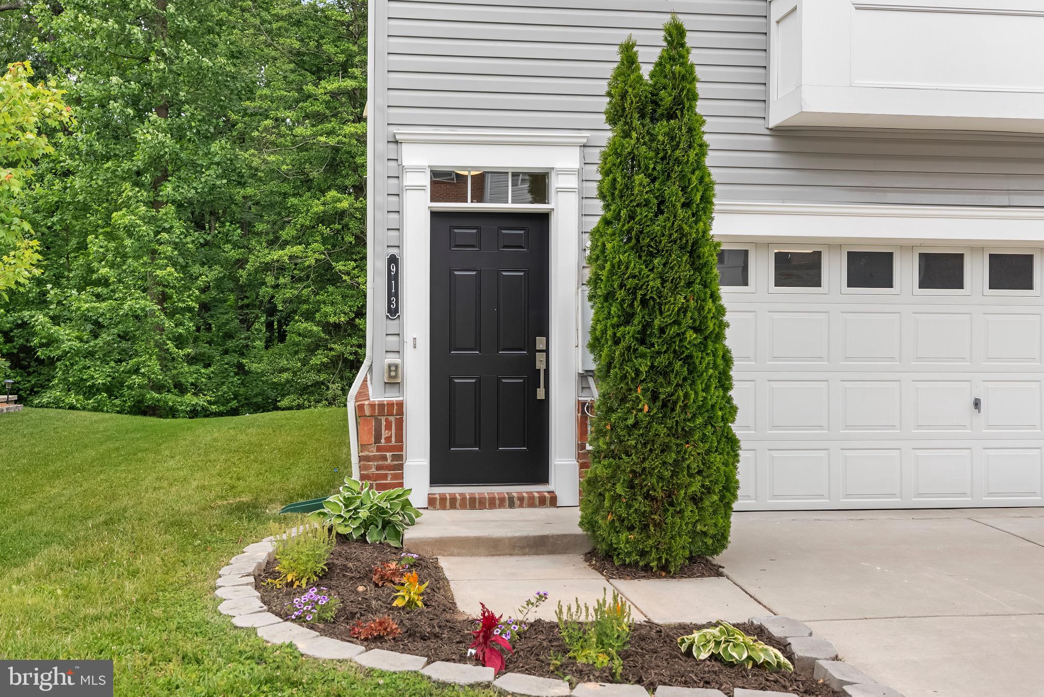913 Sandy Run Road Middle River, MD 21220 - Photo 2 of 40 a front view of a house with garden