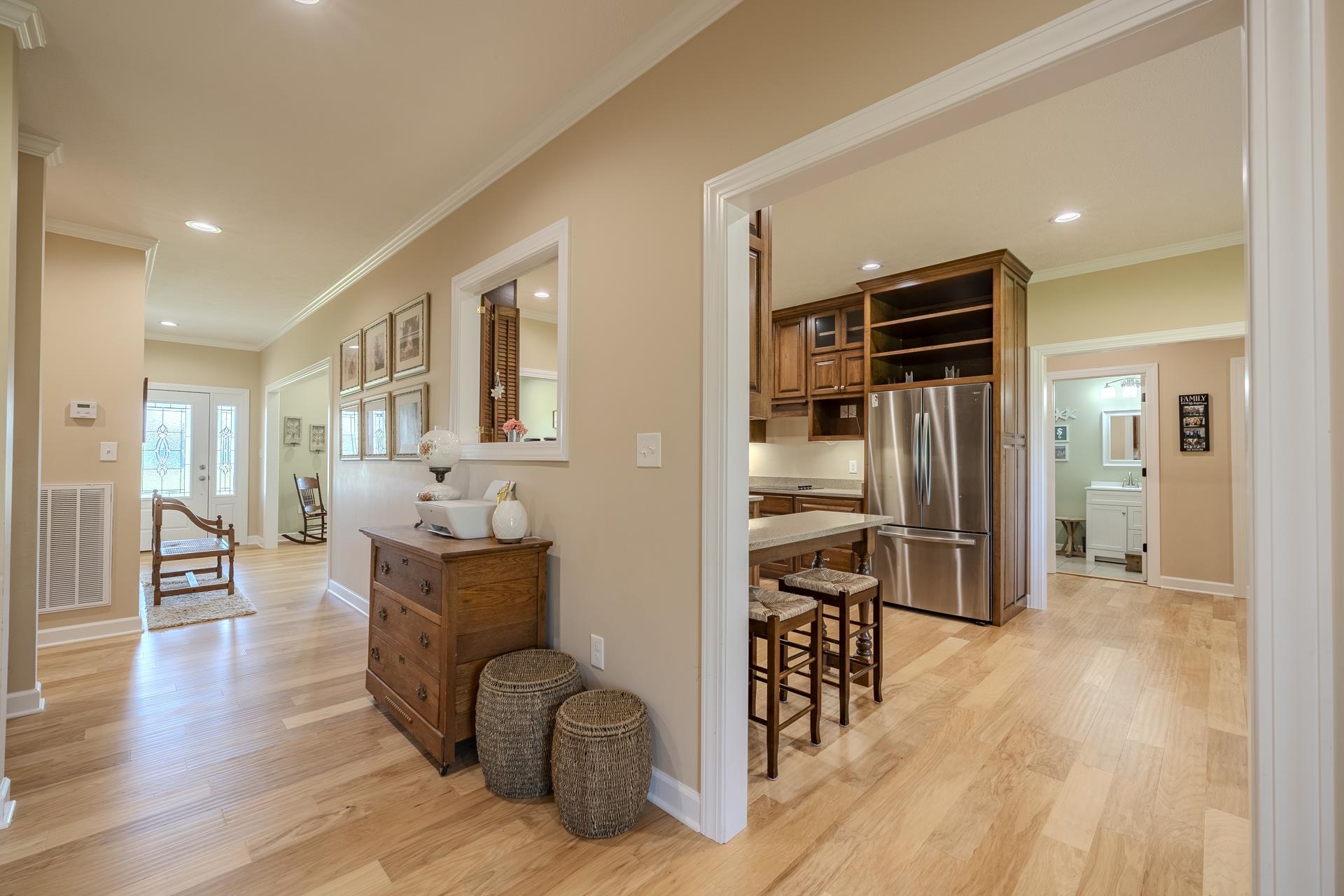170 Kirk Cove Adamsville, TN 38310 - Photo 12 of 39 Hall with light wood finished floors, recessed lighting, and crown molding