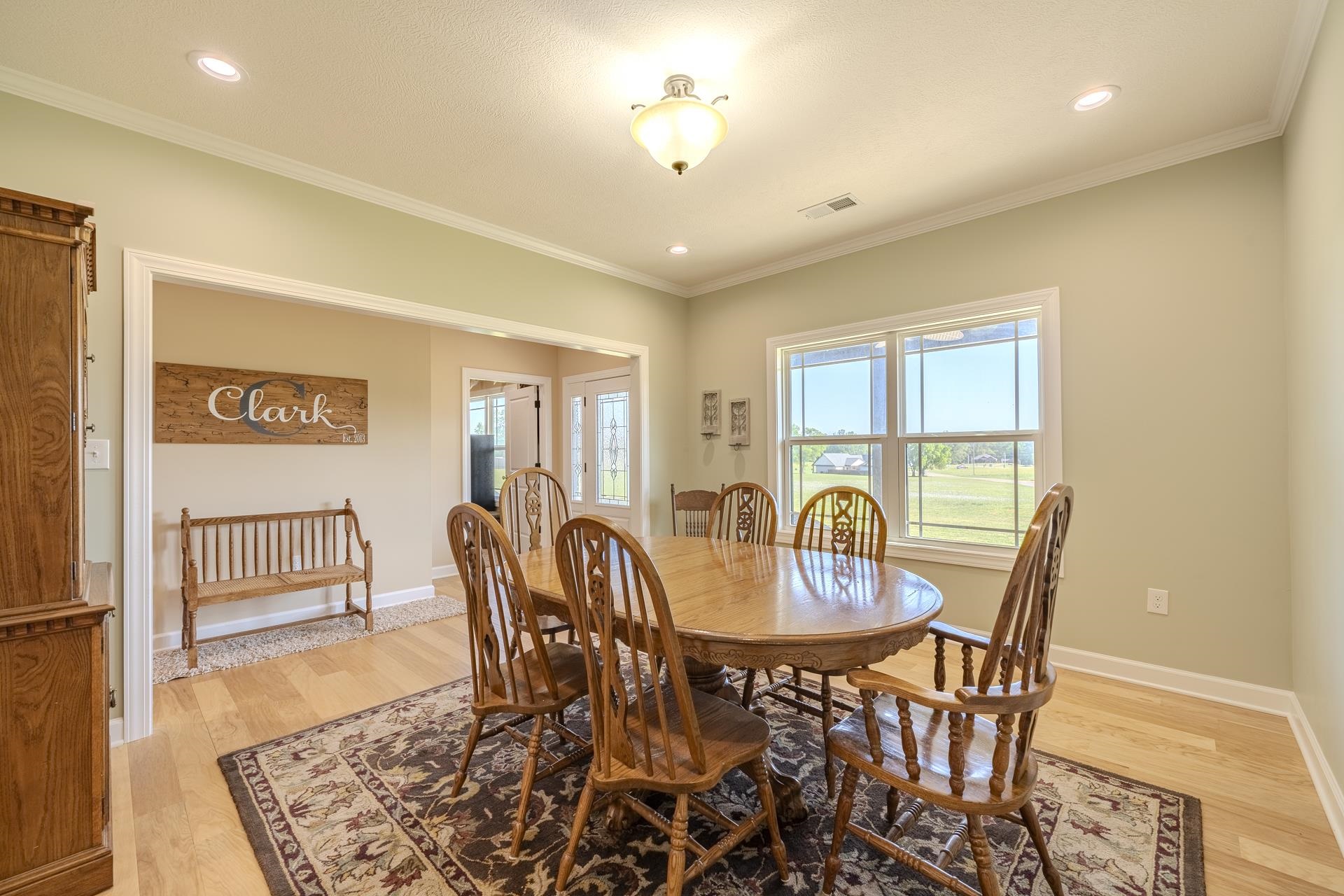 170 Kirk Cove Adamsville, TN 38310 - Photo 13 of 39 Dining room featuring light wood-style flooring, ornamental molding, and recessed lighting