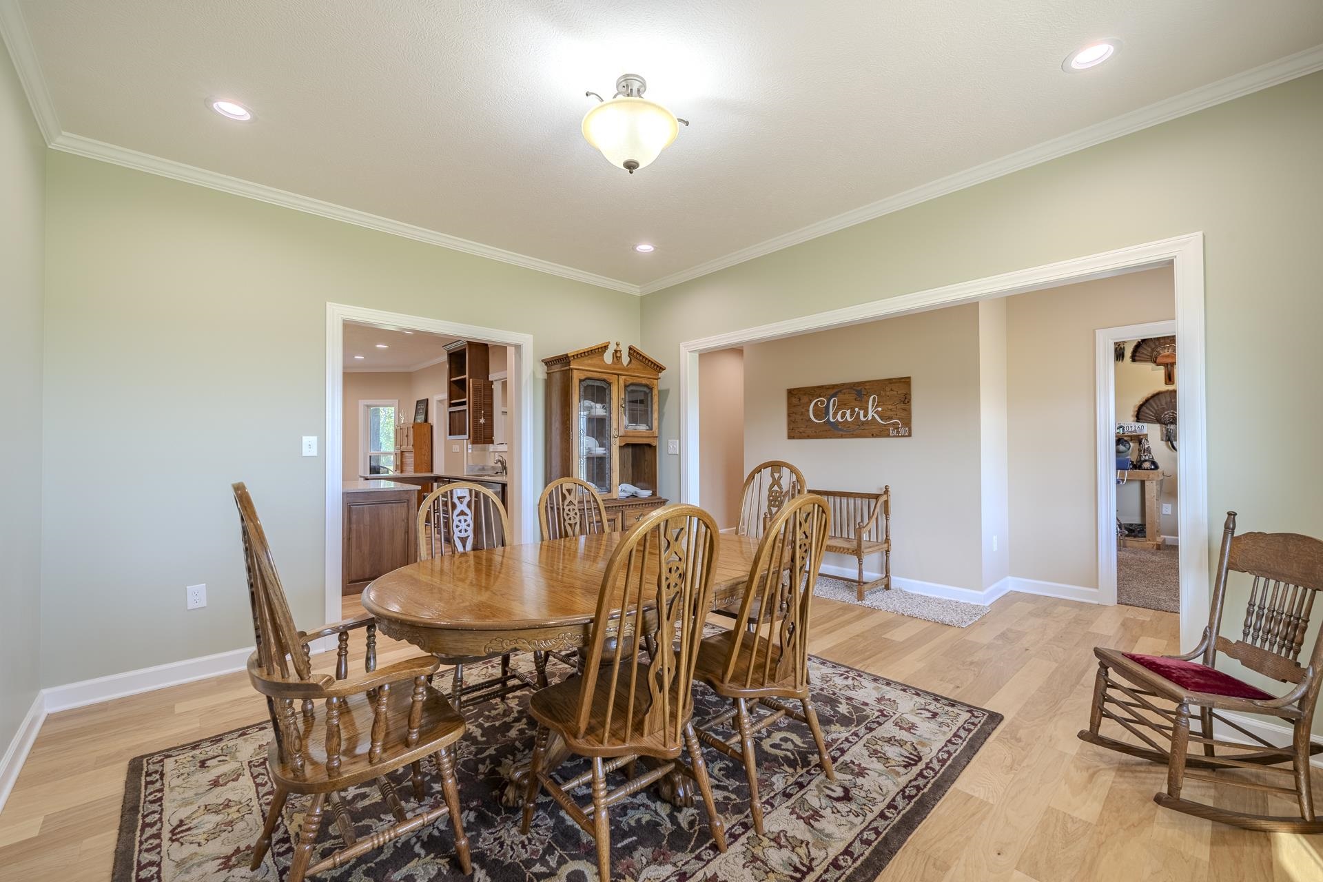 170 Kirk Cove Adamsville, TN 38310 - Photo 14 of 39 Dining room featuring recessed lighting, light wood finished floors, and crown molding