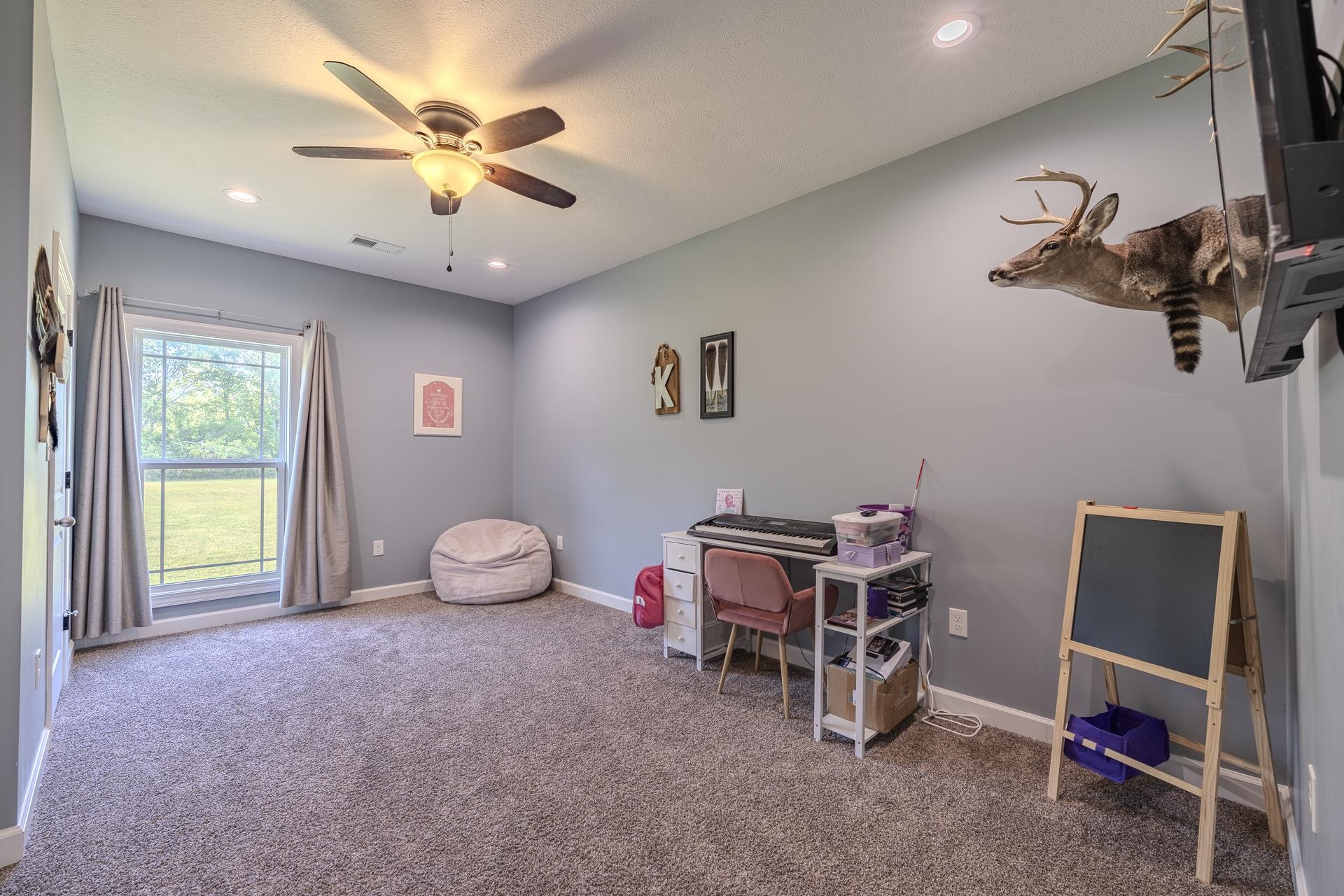 170 Kirk Cove Adamsville, TN 38310 - Photo 20 of 39 featuring recessed lighting, carpet floors, and ceiling fan