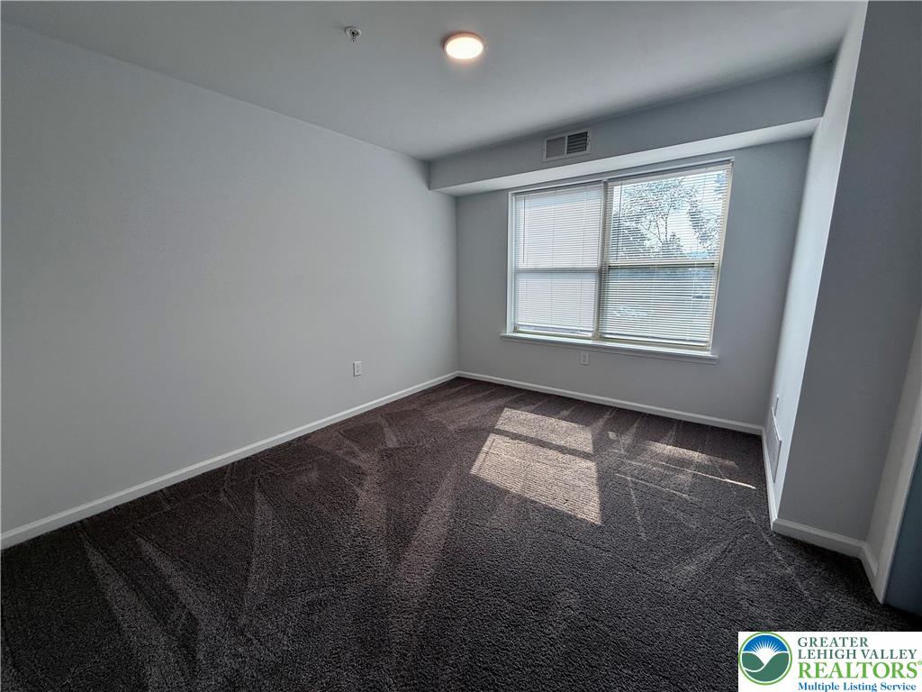 938 East 4th Street, Unit G03 Bethlehem, PA 18015 - Photo 28 of 30 an empty room with a window