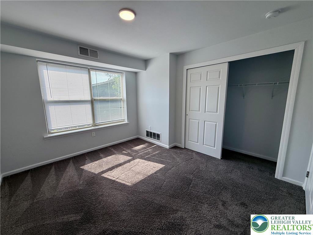 938 East 4th Street, Unit G03 Bethlehem, PA 18015 - Photo 29 of 30 an empty room with windows