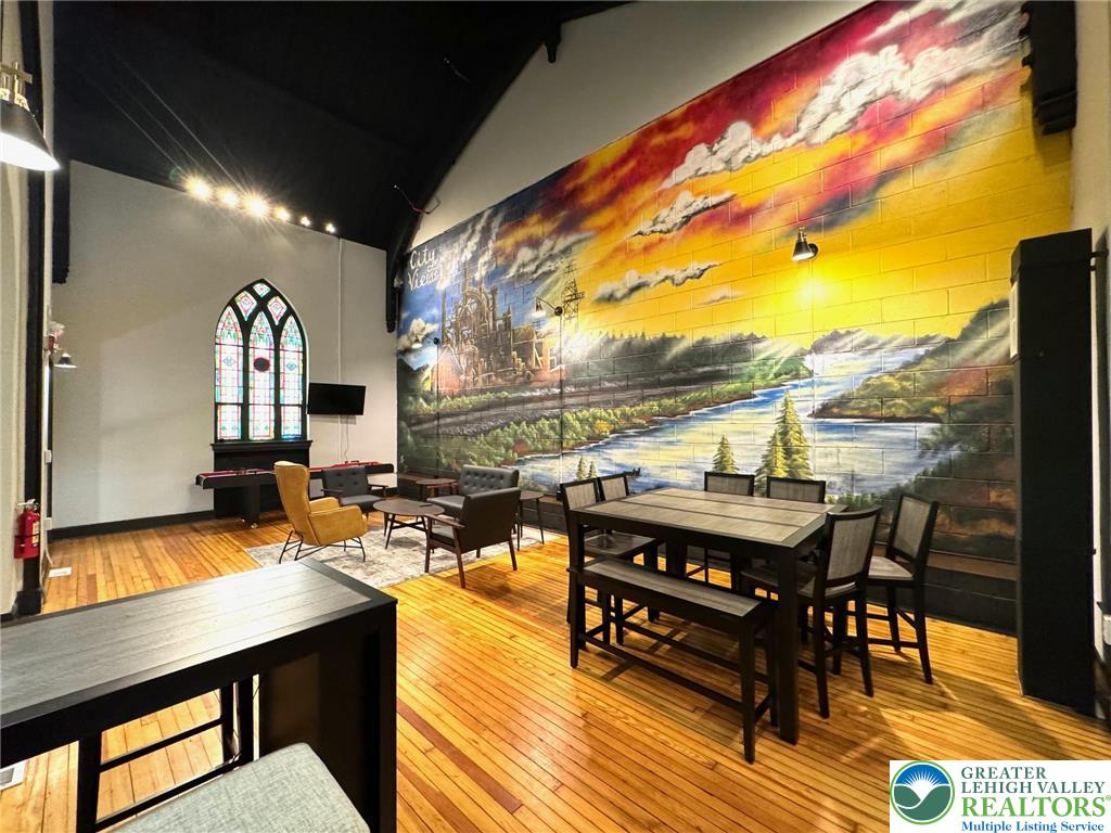 938 East 4th Street, Unit G03 Bethlehem, PA 18015 - Photo 7 of 30 a view of a balcony with chairs