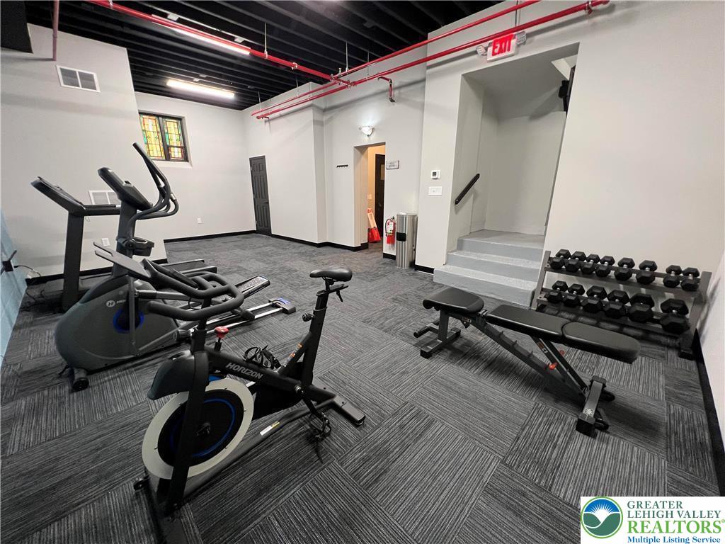 938 East 4th Street, Unit G03 Bethlehem, PA 18015 - Photo 8 of 30 a view of a room with gym equipment