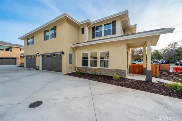 a house view with a outdoor space