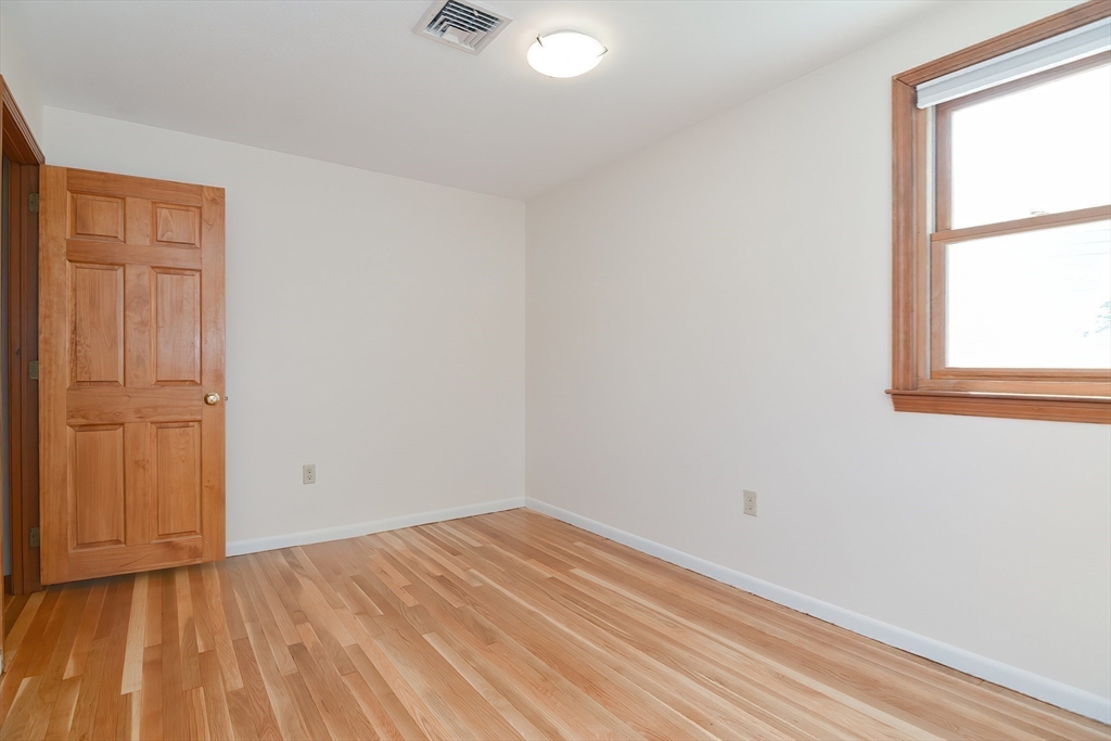 16 August Drive Framingham, MA 01701 - Photo 14 of 27 an empty room with a window