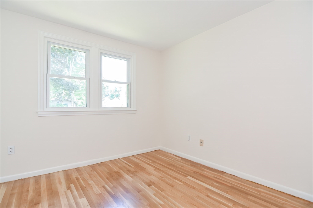 16 August Drive Framingham, MA 01701 - Photo 15 of 27 an empty room with a window