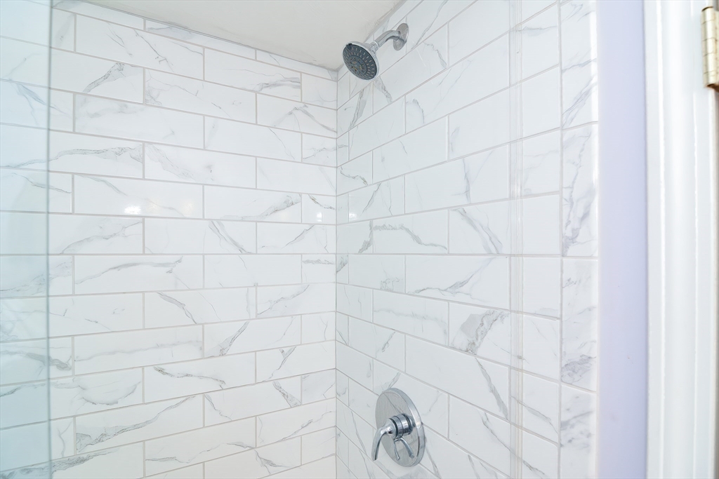 16 August Drive Framingham, MA 01701 - Photo 18 of 27 a bathroom with a shower