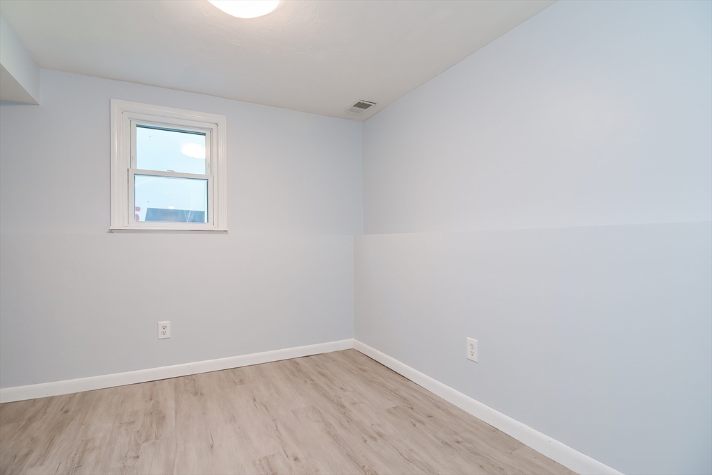 16 August Drive Framingham, MA 01701 - Photo 19 of 27 an empty room with a window