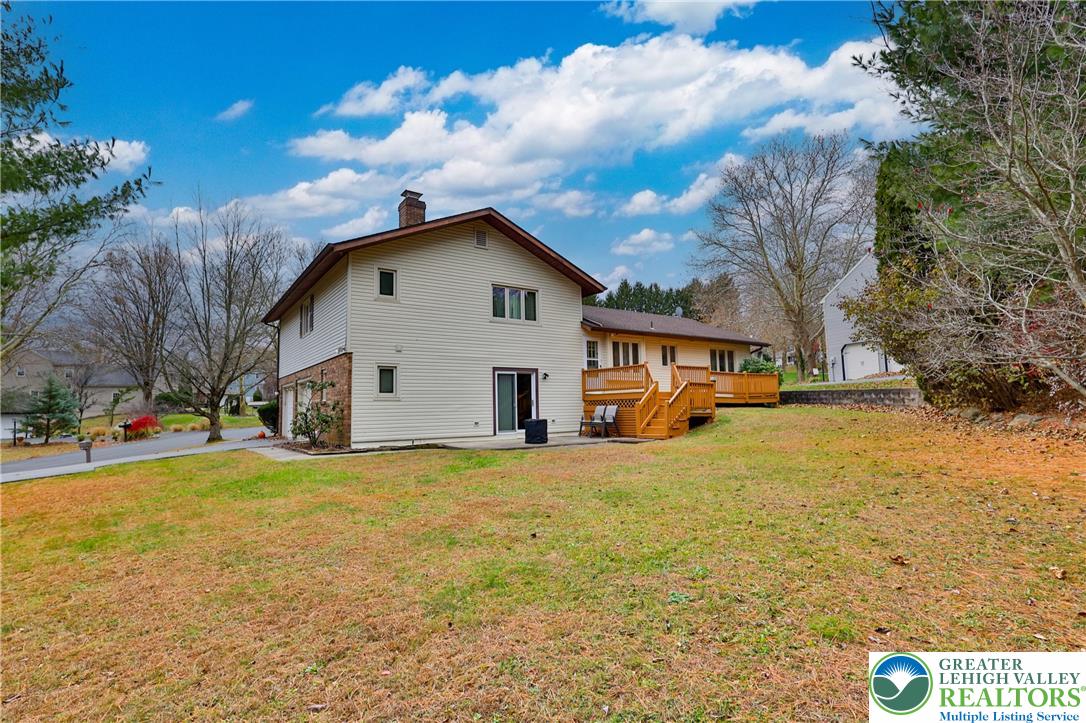 7933 Trails End Fogelsville, PA 18051 - Photo 28 of 32 a view of a house with a yard covered with snow