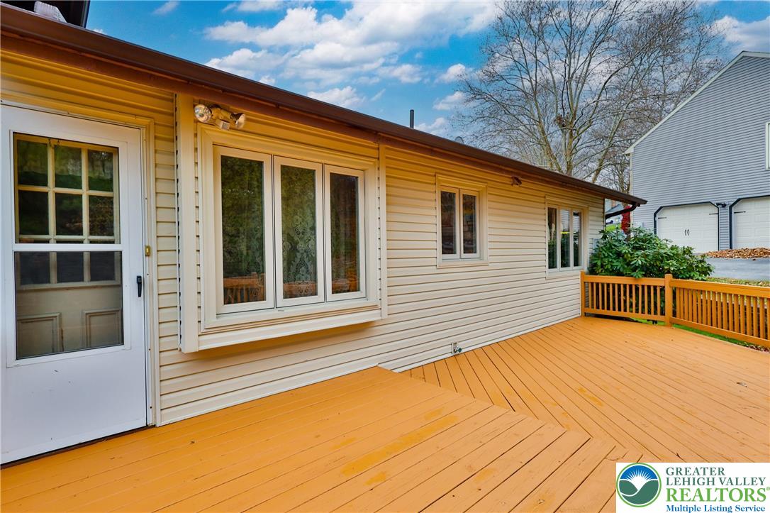 7933 Trails End Fogelsville, PA 18051 - Photo 31 of 32 a view of a house with pool and wooden fence